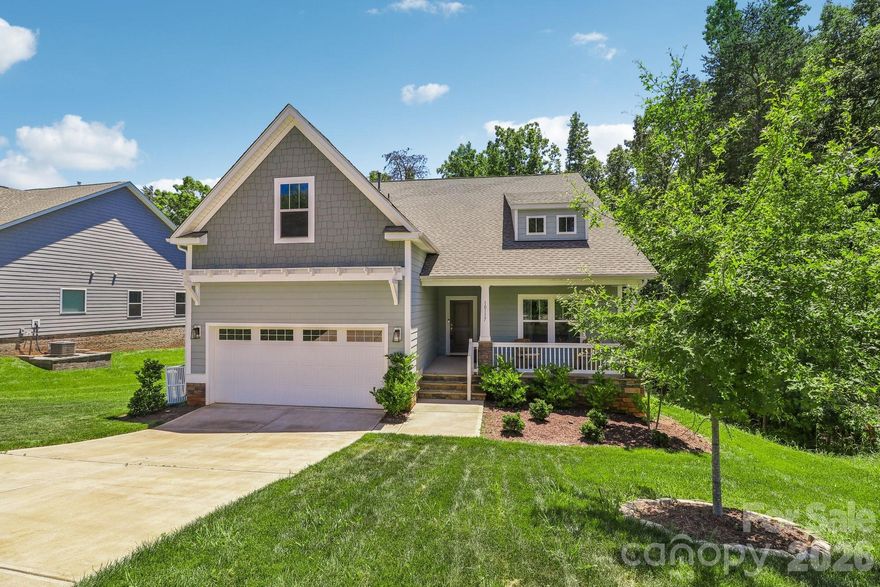 Welcome to 10117 Lakeshore Drive, a stunning 3-bedroom, 2.5-bathroom sanctuary located in the premier Edgewater Golf Community. Built with the popular Montcrest ranch floorplan, this home perfectly blends architectural sophistication with everyday functionality. The interior boasts a gourmet, open-concept kitchen featuring a butler’s pantry, wine cooler, designer pendants, and recessed lighting, alongside elegant arched entryways and dramatic coffered ceilings, all meticulously cared for and better than new. Step outside to an outdoor oasis with a screened-in porch, perfect for year-round enjoyment with a built-in TV setup, and an expansive deck ideal for summer BBQs and overlooking your private retreat. As a resident of Edgewater, you gain access to a world-class suite of amenities, including a clubhouse with billiards, a resort-style pool, tennis and pickleball courts, a marina, and the nationally-ranked Golf Club at Edgewater. Explore the waters of Fishing Creek Lake with kayaking and boating right at your doorstep. This exceptional home offers unparalleled resort-style living, conveniently located near both Charlotte and Columbia. Ready for resort living? Schedule your exclusive tour.