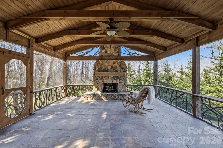 Escape to this quaint mountaintop cottage offering breathtaking 360-degree views and timeless charm. The expansive screened porch with a stunning stone fireplace creates the perfect setting for year-round relaxation and entertaining. Inside, the fully renovated primary bath is a true spa-like retreat, featuring a custom vanity, luxurious two-person soaking tub, heated floors, and all-new plumbing throughout for modern comfort and peace of mind. A new water heater installed in 2024 adds further value and efficiency. The second bath has been partially renovated, and both it and the adjoining bedroom feature new tile flooring for a fresh, updated feel. Enjoy the unique appeal of grapevines surrounding the property and a private wine cellar ideal for collectors and enthusiasts alike. A rare blend of comfort, beauty, and mountain serenity.