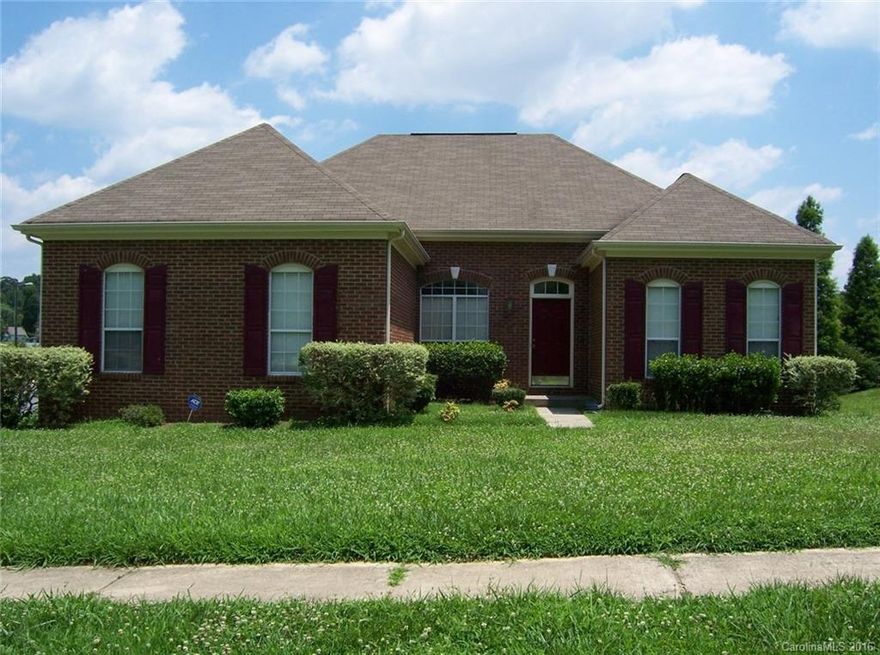 Beautiful brick-front ranch is located in a well-established neighborhood conveniently located off Mt. Holly-Huntersville Rd and minutes to Beatties Ford Rd and I-485. 3-BR, 2-bath split floor plan includes HW entry, formal DR w/chair rail molding, and large GR w/raised ceilings and fireplace. Spacious kitchen w/pantry opens to charming breakfast nook w/bay window view. Master suite features tray ceiling and private bath w/garden tub and sep shower. Situated on large corner lot w/rear deck.