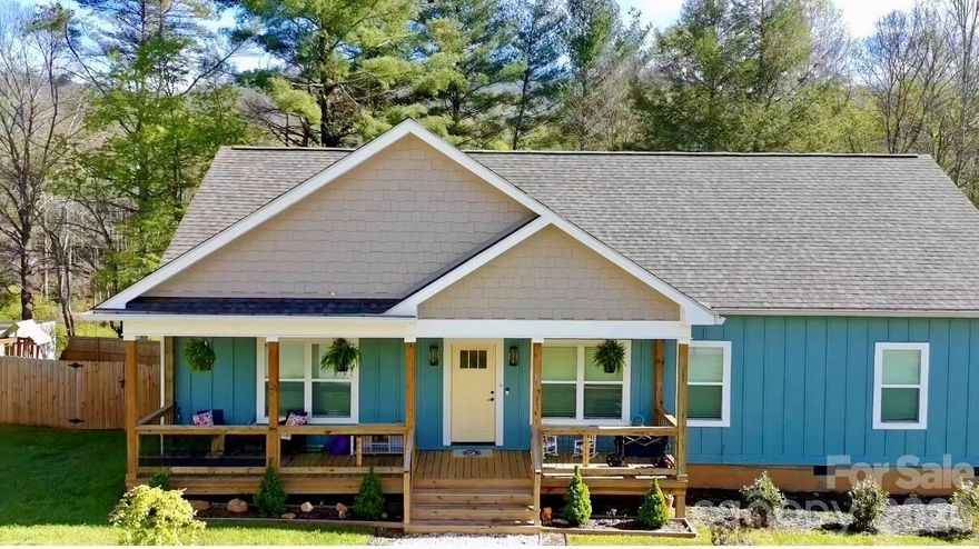 Modern 3BR/2BA family home in Bryson City’s desirable Arlington Oaks. 

This bright, open-concept residence features a chef’s kitchen with a large central island—the perfect hub for family life. The spacious primary suite has a soaking tub and walk-in shower, while secondary bedrooms feature charming accent walls and plenty of light.

Outside, enjoy a rare, massive, and fully fenced backyard complete with a premium playset and built-in fire pit. Relax on the classic rocking-chair front porch and take in the fresh mountain air.

Unbeatable location: Close to Swain Middle School and MDCS. Just 3 minutes to Ingles and IGA. Moments from Swain County Recreation Park, playgrounds, Deep Creek trails, and downtown dining. Turnkey and ready for your family!