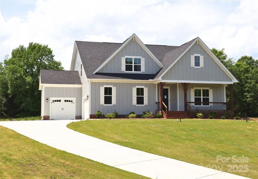 MOVE-IN READY NEW CONSTRUCTION ON 1 ACRE.  Brand new 1.5-story plan-The Madison. Open floor plan that brings the outdoors in.  The large family room boasts quad sliding doors leading to the back porch and owner's suite with its 16' vaulted ceiling. This plan will not disappoint. The kitchen, dining & family room are perfect for entertaining. The kitchen, which boasts floor-to-ceiling cabinets, quartz countertops, large walk-in pantry, and oversized island, opens to the Family Room which opens to the covered back porch through the sliding doors. The Owner’s Bath has two walk-in closets, large vanity, a huge walk-in shower with a rain shower and hand-held shower heads.  Upstairs retreat adds a 4th BR and 3rd Full Bath, plus large bonus room with wet bar and wine fridge for fun and entertaining. Crawl space is encapsulated! Must use preferred lender for incentives.