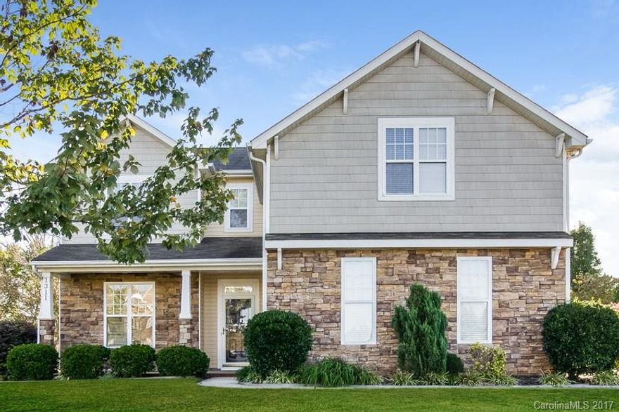 Limited time offer - $500 off your first month's rent with approved application by 11/30! Gorgeous 4 bedroom, 3 bathroom home in Waxhaw boasts stone accents and Craftsman influences. Enjoy natural lighting throughout with a breathtaking 2-story living room accented by a fireplace, a TV niche and plant shelves, and a great eat-in kitchen with stainless steel appliances and a pantry for extra storage.  The master suite offers a walk-in closet and private en-suite.