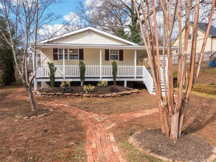 Light, bright and open in this completely renovated 3BR/2BA home in West Asheville. Nestled in between Carrier Park and Haywood Road, this home features soaring ceilings, hardwoods throughout, an open floor plan and modern kitchen with updated lighting, granite countertops, and stainless appliances. Seek respite swinging in the hammock with a good book and nice breeze on your spacious front porch, or cultivate the herb garden you've been dreaming of in your freshly landscaped yard.
