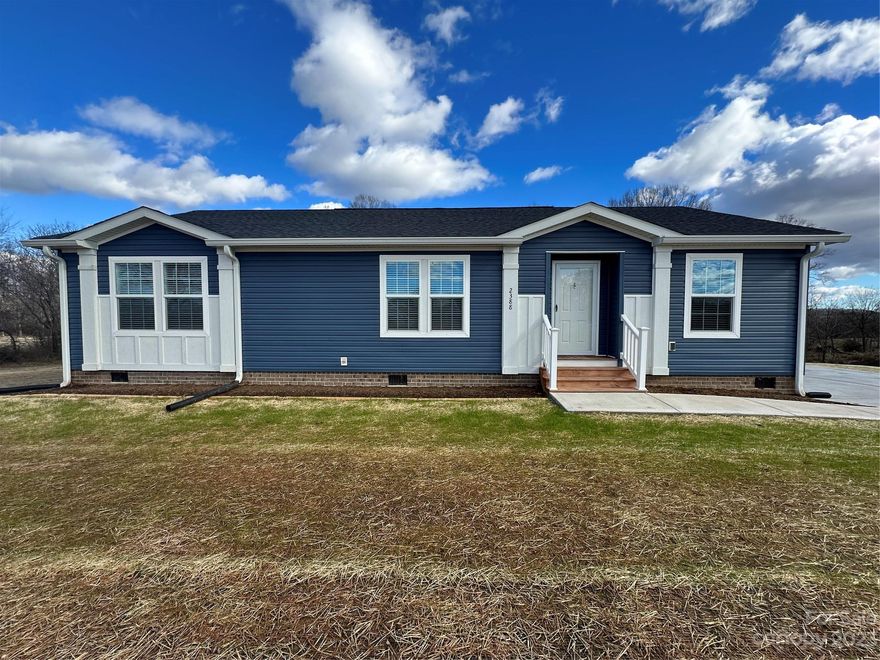 Beautiful new home situated on just under 2 acres of land. Walk in to the large living room with coffered ceilings provide a welcoming and luxury feel. Living room opens to the kitchen with oversized eat-at island and more cabinet and counter space than you will need. Just off the dining area you will find the ideal laundry room for any family. Split floor plan offers 3 oversized bedrooms with plenty of closet space. Primary bedroom en suite has garden tub and separate shower along with walk-in closet.   New deck overlooks the backyard. You do not want to miss all that this home has to offer!