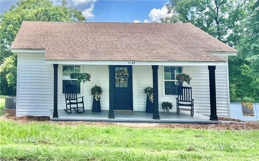 Don't miss this FULLY RENOVATED cottage with a peaceful country view! New windows, new doors, new flooring, new paint, new water heater, newly installed heat pump, new bathroom, new kitchen, new ceiling fans, new recessed lighting and DESIGNER DETAILS including shiplap walls, barn doors, white cabinetry, durable vinyl plank flooring, and stainless steel electric range. Every inch of the interior has been touched!  Enjoy peaceful, country evenings on your rocking chair front porch OR put your grill and table on your concrete patio in back.  The views of the pastoral countryside will not disappoint. MOVE IN READY!!!  Don't let this one slip by!