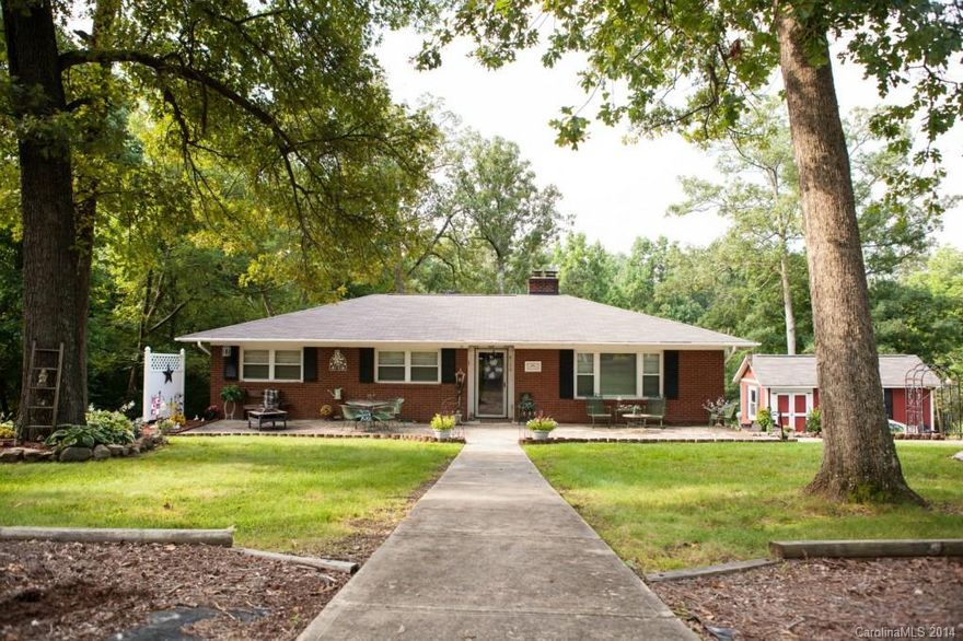 PRICE REDUCED! BRING ALL OFFERS.COME SEE ME! I am a brick ranch nestled in an established neighborhood with minimal traffic yet minutes from schools, s/c and I-85. Men love my man cave but gals prefer my adjacent rooms. Enjoy my front and back patios, terraced backyard and gas logs. Where else can you find a fireplace in the kitchen? I have hardwoods under my carpet and lots of light from my 2 large picture windows. My current owner (I've only had 2) is leaving and I need someone to care for me.