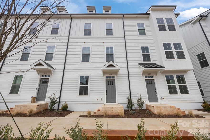 A TRUE Master Plan Community! This is more than a place to live, its also a destination! This Landon townhome offers an open flex space on the main floor and offers unmatched value without compromising on style or quality throughout. This 3 story townhome offers beautifully curated interior design finishes individually hand picked by our design team! This open floorplan with gourmet kitchen makes a great space for entertaining, or spending quiet evenings in! The difference is in the details! Location is key, and here in the River District, you are minutes from everywhere! The community itself will offer everything from pool, parks, trails to a working 2 acre farm with on site farmer to river front amphitheater and everything in between! Too much to put into words so go take a look!