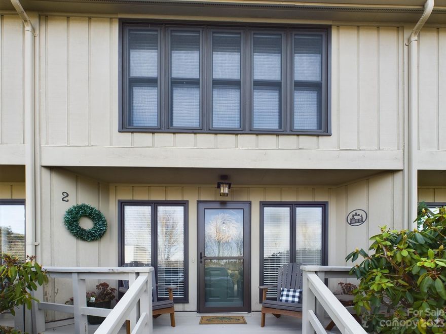 Exceptional quality & value in this immaculate, 2 story 2 BR/2.5 BA, furnished condo w/ two parking spaces a short distance to downtown Blowing Rock.  Spacious living room offers beautiful foyer, stone fireplace w/ gas logs, &  built-in wet bar. Front & back windows allow natural light throughout. The well-equipped kitchen boasts great storage, newer stainless dishwasher, ample counter space/snack bar seating. The bright dining area overlooks your personal patio (with electrical outlet & water spout) featuring, custom-built stone terraces. Stackable laundry conveniently near bedrooms. Ample closets. POA allows pets w/ restrictions, but does NO  short-term rentals. Owner also owns the outdoor back patio space!. What truly sets this condo apart is its value and proximity to the Blue Ridge Parkway, three ski slopes, & App State University among the other attractions that define the High Country. Check out the virtual tour here: https://tour.giraffe360.com/d6da2ffcdaaf4450bb77301723491052/