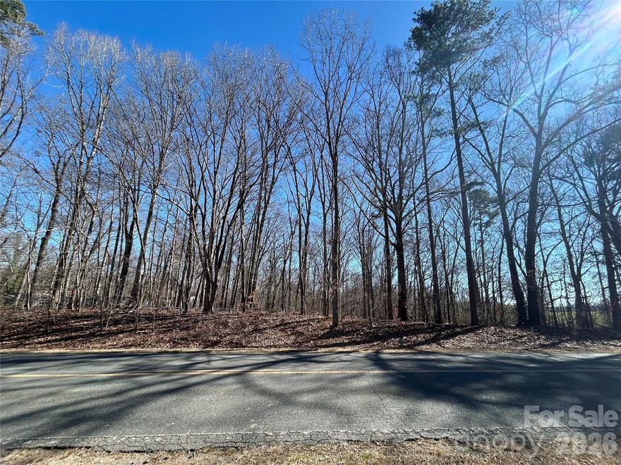 Discover this spacious .90-acre lot on Medlin Road, perfect for building your dream home. The builder already has permits in place for a well and septic system designed for a 3-bedroom home, making the process smoother for you. With no restrictions, you have the freedom to design and create the perfect living space. Located in a peaceful area of Monroe, this lot offers privacy and plenty of room to bring your vision to life. Don’t miss out on this great opportunity! (could be a basement home or have a high crawl). Reference MLS 4336655 for a to be built Home.