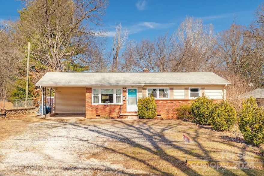 Super cute 3 bedroom ranch on level lot in convenient and charming Oakley community.   This might be the most convenient location for a home in all of Asheville. Great natural light throughout. Lovely hardwood floors.  Huge fenced back yard and spacious parking in front of the home.  Extra storage in the shed behind the home. Across the street from basketball and tennis courts, and the picnic area at Murphy-Oakley Park and right down the road from the local elementary school and public library.  Just minutes from everything that Biltmore has to offer.