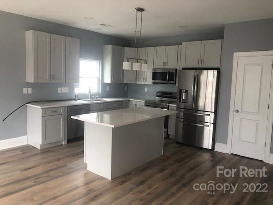 Brand new 3 bedroom home in downtown Salisbury! Kitchen and bathrooms all have granite countertops and bathrooms have marbled tile on shower surround and floors. Laminate wood flooring throughout main living area and bedrooms. Front bedroom would also make a great office with sliding barn door. Will be completely finished second week of February and updated pictures to come