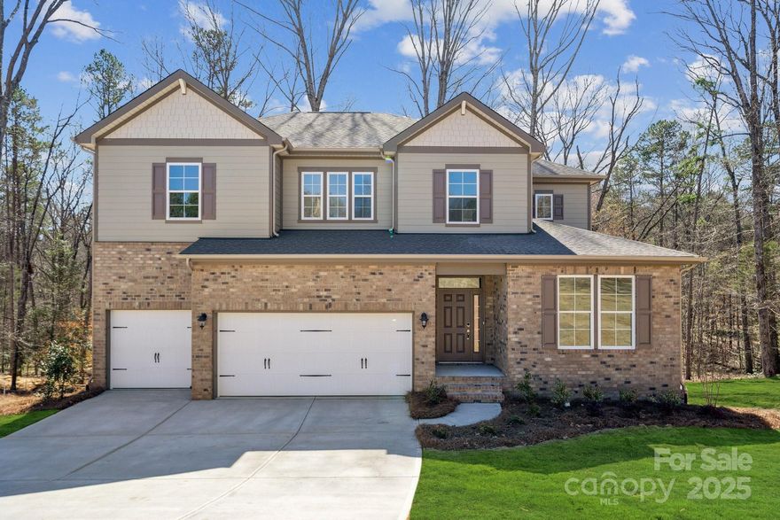 Welcome to this stunning 4 bedroom home on approximately 1 acre. This immaculate home boasts a gourmet electric kitchen with top of top-of-the-line appliances, including wall mount range, wall mount micro and drop in cooktop. soft close drawers and doors with pot doors as well, perfect for entertaining and culinary enthusiasts alike. The spacious layout includes a versatile flex space that can be tailored to suit your lifestyle, whether as a home office, gym, or playroom. loft area upstairs is a prefect media room. 3 car garage.  1.1 acres of land. Full unfinished walk out basement is a blank canvas with plumbing rough in.