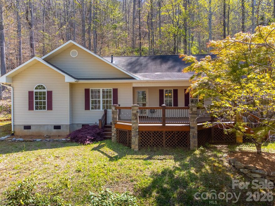 No city taxes, yet close to town. Toy Cove is lovely subdivision just off Hwy 107 and Cope Creek. Meander up the road to the concrete drive where you are greeted with artistic stonework and a gorgeous Mahogany door. Entering the Living room the mahogany continues in the 3/4" flooring. This room features  a custom built in entertainment center and stacked stone fireplace which is currently gas logs but can be wood burning. Step up into the dining room with ceramic inlaid tile and plenty of room to accommodate lots of guests. The kitchen is a chef's dream with plentiful cabinets, durable quartz countertops, stainless appliances, custom cherry cabinets and an island with gas cooktop and oven and decorative fan. Bedrooms feature Australian Cypress flooring , guest bath has quartz countertops and tiled shower, Primary features his and hers sinks, quartz countertops and custom cabinets. Front deck boasts Trex decking with stone columns, decorative metal pickets and sunset lighting. In the back is a screened in porch with hot tub for your enjoyment, There is Leaf Filter over gutters and encapsulated crawl space too. Also, a small garden shed and beautiful flora and fauna to enjoy..