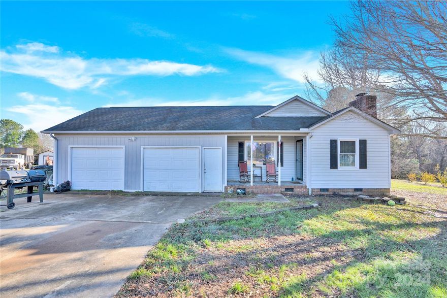 This seller is selling this home **AS IS**, providing an excellent opportunity for customization or investment. Enjoy the peaceful country setting while being just a short drive from Mooresville’s amenities.  3-bedroom, 2-bath home located on a cul-de-sac in the countryside of Mooresville, in Rowan County. Situated on a spacious 1.2-acre lot, this property offers privacy and room to enjoy outdoor living. The home features an attached 2-car garage and a detached 27'x29' workshop/garage with 10-ft doors and concrete floors, perfect for hobbies, storage, or workspace.  
Priced to sell quickly—don’t miss out! Schedule your showing today.

Automotive lift in detached garage/workshop and propane tank next to house do not convey.
Workshop/garage that is in the back is a 2 bay with 10 foot doors and 6-8 inch concrete and 60 amp electric.