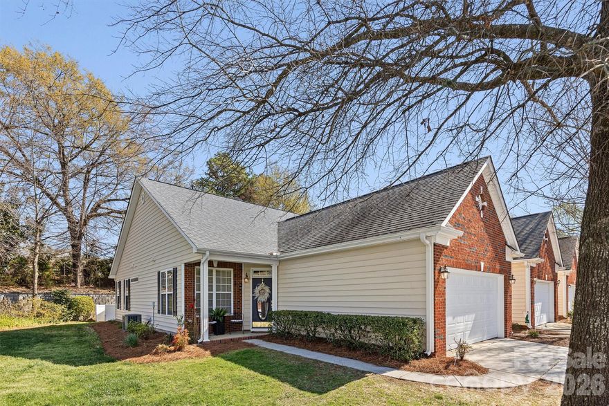 Welcome home to 1657 Onyx Ridge, Fort Mill.  This updated townhome in the 55+ neighborhood of Four Seasons at Gold Hill is the perfect spot for you to enjoy low-maintenance living.  With 2 bedrooms, 2 bathrooms, a living room and full dining room/or flex space, this home checks all the boxes!  This is a one level end unit with community maintained green space on one side and in the back, you will find a patio surrounded by a white fence and a private backyard space.  Before hitting the market, new luxury vinyl plank, kitchen cabinets, paint and toilets were all updated.  HVAC was replaced around 2020, the roof is maintained by the HOA, and the re-plumbing of the whole house has been done.  A large 2-car garage offers convenience and storage and the front porch is the perfect place to sit and enjoy this quiet neighborhood or have your morning coffee.  This amenity -rich community offers so much to do, with a pool, pickle ball and tennis courts, a clubhouse, a calendar of events, a list of social clubs and more! Four Seasons is convenient to shopping, dining, hospitals and I-77.