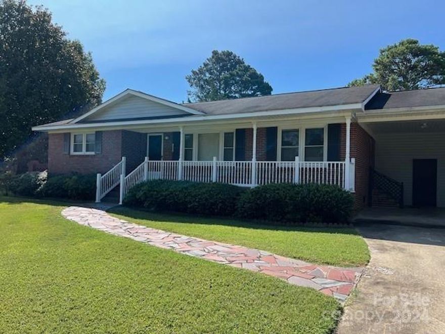 Welcome to this inviting brick home with classic curb appeal, featuring a charming front porch perfect for enjoying your morning coffee. Situated on approximately 3/4-acre lot, this spacious ranch-style home includes 3 bedrooms, 2 full baths, living room and dining/kitchen combination, providing plenty of room for family living and entertainment. The home boasts beautiful hardwood floors adding warmth and character to this home.

While the home is move-in ready, it also presents an exciting opportunity for updating and personalizing to suit your tastes. 

This home is full of potential and ready for its next owner to bring in their vision. Don’t miss out on this fantastic opportunity—schedule a showing today!