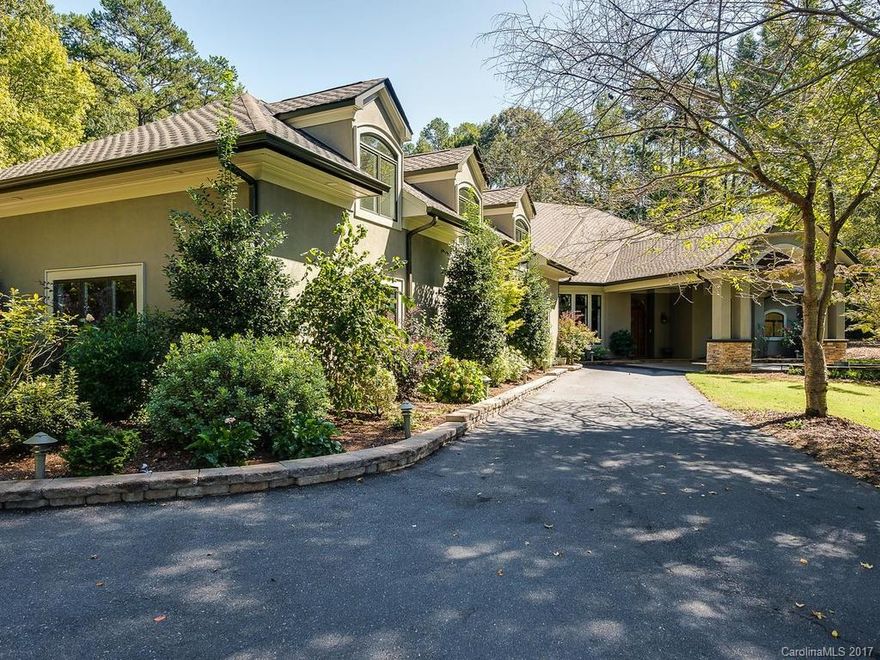 Stunning home on 12.47 acres. Fabulous setting! Beautiful grounds w/pool, pond, gazebo, dock & fire pit. The interior of the home is open w/beautiful high ceilings & gorgeous crown molding in most rooms. Lg custom kitchen. Fabulous MBR Suite w/FP & sitting area. The MBA has a steam shower & lg jetted spa/tub. The 2nd floor could be a nanny or in-law suite complete w/kit. Detached workshop has 1366 heated sf of flex space. The garages have 4547 unheated sf - a craftsman/auto hobbyist paradise.