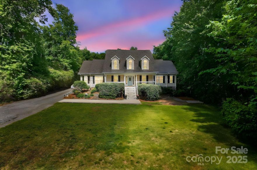 Want room to breathe, with no HOA? This is the one you've been waiting for with an acre of land, and more than 3400 square feet of living space. Great curb appeal with covered front porch, lush landscaping and pond with fountain. Inside, a foyer/drop zone area leads to the spacious living room and the dining room. It connects to the kitchen with white painted cabinetry, stainless appliances and windows to the peaceful backyard. There are three main level bedrooms, and two baths including the large primary suite. It spans an entire side of the house, with walk-in closet, and bath with dual vanity, separate shower and jetted tub. Upstairs offers two more bedrooms and a bath, and an expansive bonus area, the perfect family room or play space. Relax on the back deck, overlooking the yard. Fantastic placement sitting back from the road, and a short drive to put your boat in Lake Wylie. Welcome home!