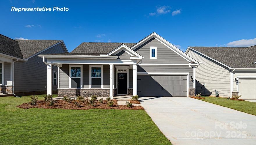 The New Cedar 1 1/2 story plan is a Very versatile Plan!  This impressive home has an inviting front porch & Popular split floorplan.  Primary bedroom is comfortably situated in the rear of the home w/walk-in closet, dual vanity & walk in shower with a built-in bench. The open concept kitchen boasts quartz counters and a gas range and is open to the dining and family room areas.    Many upgrades are included in this home such as crown molding throughout living on the main floor & Rev Wood flooring in main living & dining areas.  All this and a Large pool & clubhouse to come; Only a few minutes to a Lake Wylie boat ramp & park. Home is connected includes programmable thermostat, Z-Wave door lock and wireless light switch, touchscreen control device, automation platform, video doorbell, and Amazon Echo pop!  Note: We now have a modern style trim package!  All features are subject to change without notice.  ASK ABOUT OUR BFC INCENTIVE (INTEREST RATE BUY DOWN WITH PREFERRED LENDER)!!!!