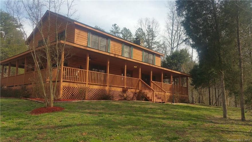 WELCOME HOME to this beautiful LOG CABIN FARMHOUSE with WRAP AROUND PORCH in the desirable Bostian Elementary and Carson High school district! With over 2500 square feet and a partially finished heated basement, this home has features galore including  granite countertops throughout, stainless steel appliances, gleaming hardwoods and a luxurious master suite with jacuzzi tub! Bonus being used as 4th bedroom and dining room as office.  Contact us today!