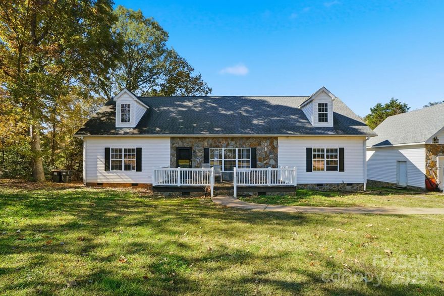 Discover this well-maintained one-story home set on three parcels totaling 2.3 acres, offering privacy, flexibility, and room to grow—just minutes from I-40 while still tucked away in a peaceful setting. Located on a quiet dead-end street, the property offers a peaceful, natural setting with frequent deer sightings and a sense of privacy rarely found so close to town.

The main level provides comfortable single-story living with an inviting layout ideal for everyday life and entertaining. In addition, the home features a fully framed upper level within the roofline, offering substantial future expansion potential for additional bedrooms, a home office, children’s play room, or bonus living space (buyer to verify permitting and HVAC requirements). This space is already laid out and ready for customization, making future finishing straightforward and flexible.

A detached two-car garage includes a finished bonus space above, complete with drywall, flooring, lighting, electrical, and a window heating and cooling unit—perfect for a home office, studio, gym, or hobby space. This area is not included in the home’s heated living square footage.

Outdoor living is a highlight, with a recently stained back deck overlooking the expansive property, ideal for relaxing or entertaining. A hot tub and above-ground pool convey as-is.

Whether you’re looking for a home with space to grow, versatile bonus areas, or acreage with long-term potential, this property offers a rare combination of usability today and opportunity for tomorrow.