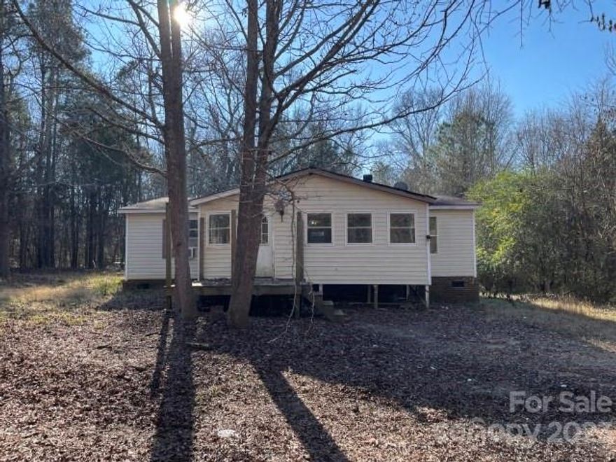 3 Bedroom 2 Bath Home on Generous 1 Acre Lot. Home in need of Repairs and updates to be move in ready. The property is sold As-Is, Where-Is. Seller has no knowledge, buyer should perform their due diligence and make their own assessments. Age of Home is Approximate.