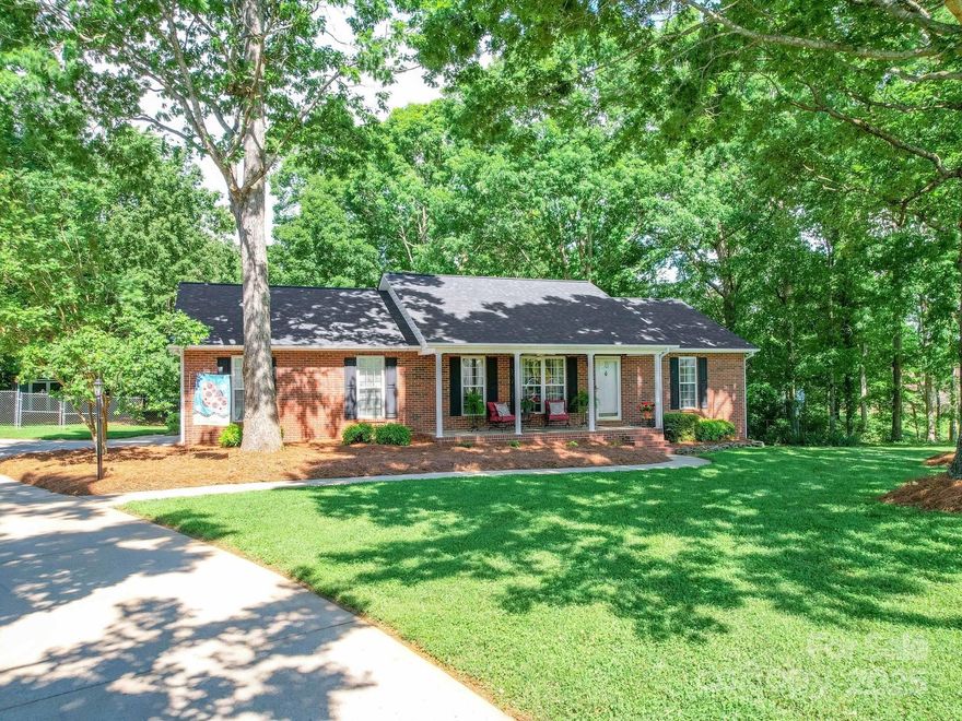 Welcome to this charming, well-maintained, one-owner ranch home! Enjoy the convenience of small-town living without an HOA or City Taxes! This 3-bedroom, 2-bath home is located on a cul-de-sac with a beautiful curving driveway leading to a side-load two-car garage. Relax on the front porch or enjoy the privacy of your screened-in porch, which overlooks a wooded, fenced-in backyard. Inside, you’ll find crown molding, a custom accent wall in the dining area, a separate laundry room with cabinetry, a kitchen pantry, granite countertops, and tile backsplash. All kitchen appliances remain, including the refrigerator. Home is filled with plenty of natural light. Recent updates include a new HVAC system installed in September 2024, a new roof, and screened-in porch added in August 2022 (note: no permits were obtained for the porch).  A list of additional updates/upgrades is available in the attachments.  This home is move-in ready and awaits your arrival!  Showings will begin on 5/8/25.