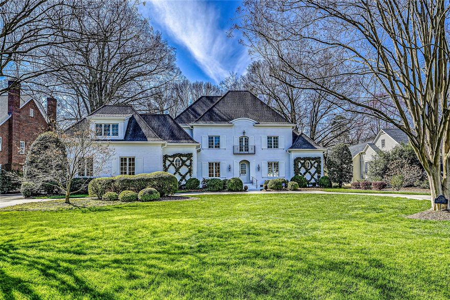 Stunning, completely updated all brick home on amazing, private lot in Pharr Acres. 10ft ceilings on main, newly refinished hardwoods throughout, and new gorgeous wallpapers. Bright entry, Study/living room, formal Dining room. Family room w/ built-ins and fireplace. Kitchen update in 2022, new quartz counters & backsplash. Large eat-in island, serving bar, Built-in desk & spacious breakfast area. Drop zone leading to 3-car garage. Large laundry w/sink and tons of storage. Screened porch w/wood burning fireplace overlooking large, flat manicured lot. Large primary suite on main level w/and large walk-in closet, renovated marble master bath w/ large soaking tub, dual marble vanities & Huge walk-in marble shower! Three additional bedrooms on the upper level all w/ walk-in closets and renovated en suite baths! Large family space on upper with built-ins and large bonus room w/bar area & full bath. Fenced yard, Irrigation system, pool and cabana drawings in attachments! Awesome location!