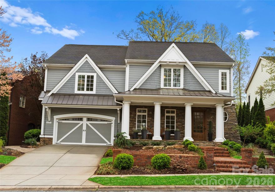 NEW PRICE! Exquisite Simonini Waterfront Estate with Exclusive Pontoon Beach Access
A rare and exciting opportunity to own an exquisitely crafted Simonini-built waterfront home in the coveted Captains Point community—now available at an extraordinary new price!
The Property & Design
Designed for refined living, this distinguished estate boasts a striking façade of stacked stone, Hardy board, and shaker accents, complemented by a grand covered porch. Inside, a soaring foyer introduces elegant living spaces, including a formal dining room with intricate millwork and a sunlit great room anchored by a marble-surround fireplace. The chef’s kitchen is an absolute dream, featuring a substantial island, premium appliances, and a walk-in pantry, seamlessly flowing into a sun-drenched breakfast nook with serene lake views. A stately office opens directly to a covered loggia with a cozy stone fireplace, perfect for year-round enjoyment.

****Unmatched Lake Access & Outdoor Living****

This is where the magic happens! This is the ONLY home in the neighborhood that offers the ultimate convenience: the ability to pull your pontoon boat right up to your private beach and walk effortlessly from the sand into your backyard! Forget the dock (though a deeded slip is also included)—experience true, direct boat-to-backyard access.