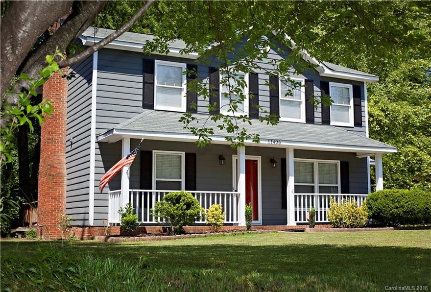 Beautiful craftsman-style home convenient to the best amenities in Charlotte! Great for entertaining in this open floor plan w/ beautiful concrete stained floors in great room & cozy fireplace, updated kitchen w/ cream cabinets, new hardware, updated lighting, corian ctr tops, tumbled marble backsplash, laminate & tile flrs thru-out. Vaulted ceilings in master w/ 2 good-sized closets. Master bath w/soaking tub & lots of counter-top space. Two ample-sized bedrooms. Private backyard w/storage bldg