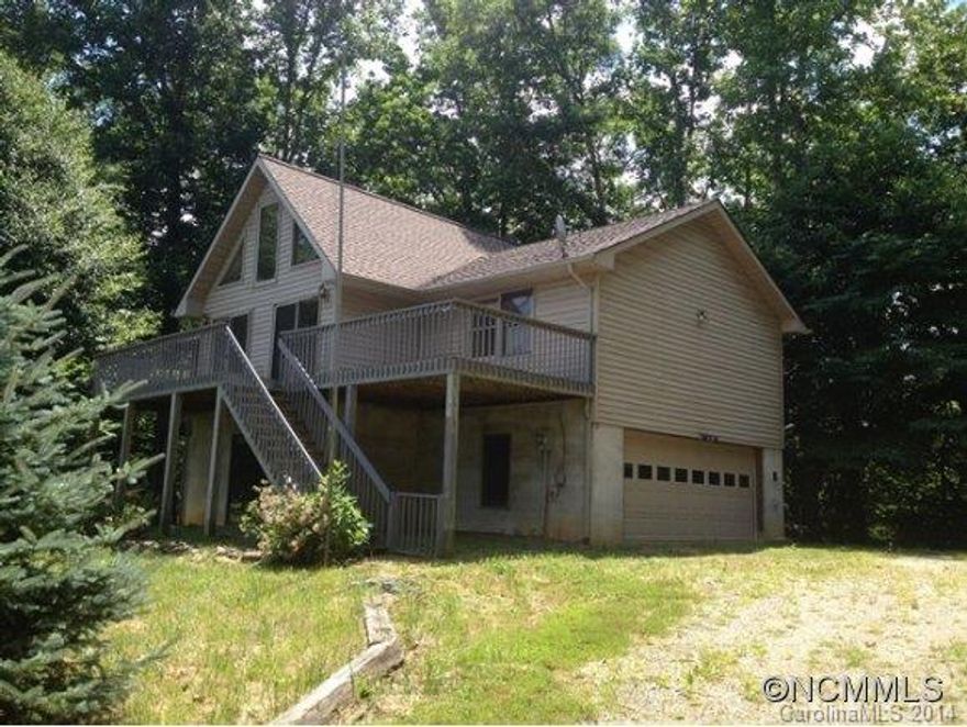 Enjoy the beautiful mountain views and privacy this 3 bed/2 bath mountain home has to offer. Home features an open, split-bdrm floorplan w/ cathedral ceilings, lots of natural light, master suite, large deck, and a full unfinished/daylight/walk-out bsmt.  Suitable as a primary residence or mountain vacation home! Seller/Agent make no representations. MLS info not guaranteed. Please review attached offer instructions.