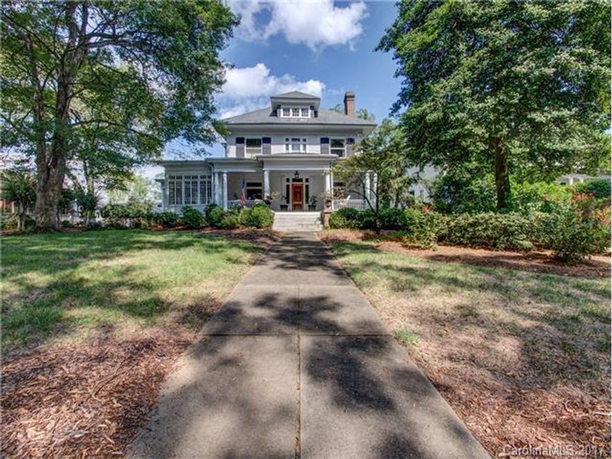 THIS IS IT! Located in Historic Downtown Concord, this elegant home invites you in with its immediate curb appeal and large front porch. This architectural (Colonial Revival) gem was built in 1910 with updates galore by the current owner. The old and new blend together beautifully while still maintaining the character of the home. The space flows smoothly with large open rooms soaked in natural light. 10' ceilings on each floor. Custom electric gate. Brick wall outlines backyard for privacy.