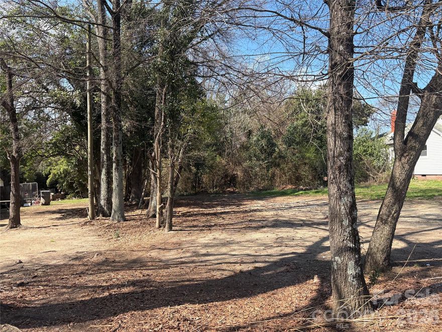 Beautiful level lot in one of the city's most vibrant and growing areas. Lot has good road frontage and is in an excellent location for future development.  Close proximity to uptown with excellent access to airport and all the new restaurants, coffee shops, and shops in the area. See survey attached.