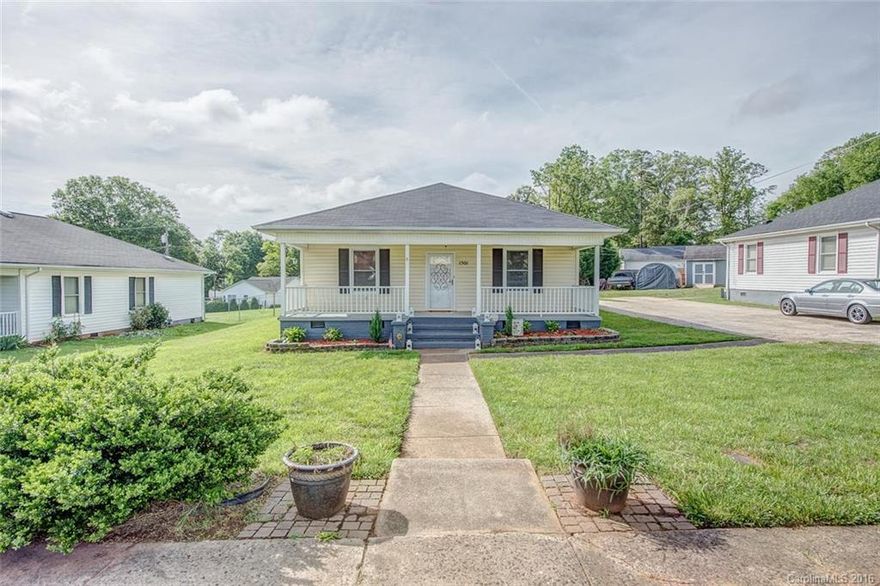 Belmont bungalow beautifully updated in fantastic location!  Wood floors and an open concept make this home current but it still has all the charm of a classic bungalow.  Curb appeal with covered front porch and space for relaxing at the end of the day.  Convenient location and you can even walk to the grocery store your so close!