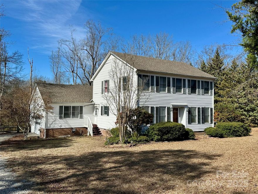 If you are looking for a two story home on at least an acre lot, situated in a well established neighborhood of Pageland, SC, this one may be for you!!  The first floor features an open kitchen/den with fireplace, half bath, laundry room, dining room, living room and foyer with lots of hardwood floors.  There is an access from the den/kitchen to the rear screened porch and adjacent open deck. The second floor features a primary bedroom/bathroom with walk in closet and two additional bedrooms with convenient access to the full hall bathroom.  There is an attached side load garage and plenty of room to roam in the spacious back yard that  extends to a rear border creek. Move right in or update to your personal style.