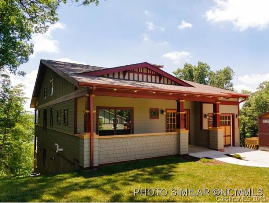 Custom home in Historic Kenilworth-Robert Griffin contemporary craftsman design. This property boasts energy efficient finishes, open floor plan, long range mtn views throughout, master& guest suite on main, custom kitchen, hickory floors, gas stainless steel appliances, granite, gas furnace, brilliant natural light,two back decks overlooking the mtns. Under Construction Taxes TBD