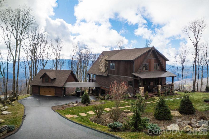 This spectacular cabin in the sought-after Lodges at Eagles Nest combines rustic mountain charm with modern luxury. Built to impress, the home’s dramatic Great Room delivers instant wow: a massive A-frame glass wall framing long-range mountain views, a floor-to-ceiling stone fireplace, and a 27-ft tongue-and-groove vaulted ceiling that unites the kitchen, living, and dining areas in an airy open plan.
This 3-bedroom, 2-bath, 1-half-bath home features wood ceilings and hardwood floors throughout, travertine and granite finishes in the baths, and high-quality kitchen cabinetry with granite counters and top-of-the-line appliances. Enjoy sunsets and panoramic vistas from the Great Room or the large covered deck. The finished basement offers a spacious entertainment room for family gatherings and easy access to a lower deck with a generous hot tub.
Outside, a lush, meticulously landscaped yard, a fire pit, and a detached two-car garage complete this dream mountain retreat. Sold fully furnished and decorated. Call today to schedule your personal tour!