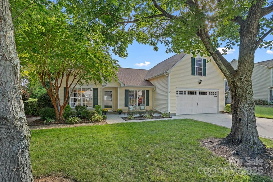 This beautifully updated 4-bedroom, 2-bathroom home in Linwood Farms, within the Mooresville Graded School District, sits on a flat, nicely landscaped quarter-acre lot. Freshly painted interior, it features an open floor plan with hardwood floors in the main living areas. The kitchen includes stainless steel appliances, granite countertops, a large pantry, and a peninsula with seating for four. The main level offers an office or dining room, a spacious family room with gas fireplace, and a primary suite with a cathedral ceiling, large walk-in closet, and an en suite bathroom recently updated with beautiful counters, a new vanity, and a tiled shower with body sprays. Two additional bedrooms and a full bathroom are also on the main level, with a large fourth bedroom upstairs. The home includes a two-car garage for convenient parking and storage. Outside, enjoy a private patio, fully fenced backyard, and a charming garden shed. Community amenities include a clubhouse, pool, and playground. Schedule a showing today!