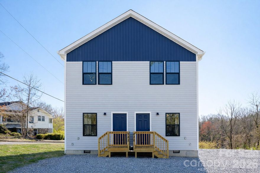 Newly constructed duplex in a rapidly growing Candler location with easy access to Asheville, I-40, and Smokey Park Hwy. Situated on a large, nearly half acre cleared corner lot, this property offers a rare combination of space, privacy, and convenience. Each unit features a bright, open concept, layout with modern finishes, including granite countertops, stainless steel appliances, tile showers, and durable LVP flooring. BOTH UNITS OFFER TWO MASTER SUITES, providing exceptional flexibility for roommates or maximizing rental potential. Main level laundry adds every day convenience and functional design. Enjoy private deck space overlooking a peaceful wooded setting – perfect for relaxing or entertaining. Energy efficient mini-split systems provide cost-effective heating and cooling, while new construction ensures low maintenance and long-term durability. Ideal for owner occupants, house, hacking, or investors seeking a turn key property in a high demand area.