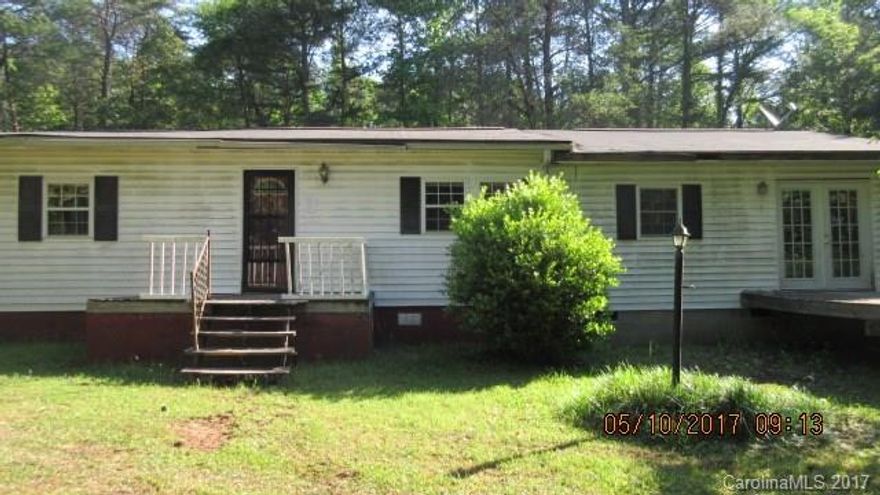 Ranch style home in rural location off of private driveway with outbuilding. Cash offers only. Property sold "as-is, where-is."