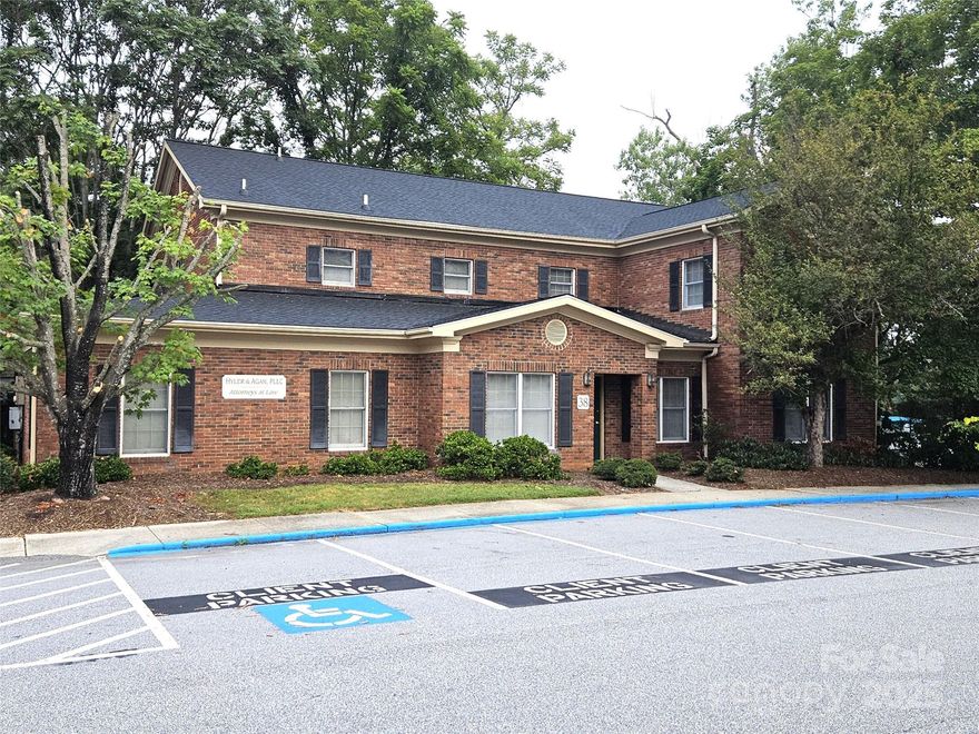 Exceptional location! Just blocks north of Asheville’s downtown core & 1 block east of Merrimon Ave's thriving business corridor, this distinctive 4,500 sf brick office bldg. is 1 of 4 within Orange St Professional Park. Inside, the layout is ideal for a mid-size practice with 14 offices, 3 conference rooms, 3 restrooms & more! Clients & employees will appreciate the ease of access and focused work environment without the noise and parking challenges of the downtown core. This is the perfect opportunity to invest in your own workspace or, buy a stable, leasable asset in a high demand market! Sale-leaseback, 1/1/26 delivery; 22 onsite parks with revenue share! By appointment!