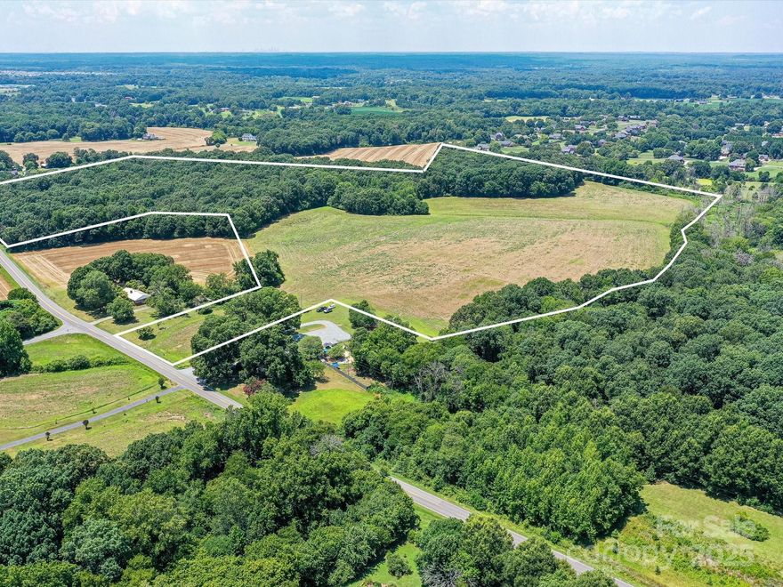 FIRST TIME OFFERED!!  LOCATION! LOCATION! LOCATION!  Prime acreage in highly sought after area.   Open and wooded with approximately 57 acres (MOL) in Unionville with small pond on property!   County water and natural gas on Unionville Indian Trail Rd.  Convenient to Monroe Bypass, Hwy 74 and Hwy 601 offering easy access and convenience to many amenities in Monroe and Matthews. A picturesque property with potential for equestrian purposes, multiple family members all with their own space and many other opportunities.  A beautiful, tranquil setting!