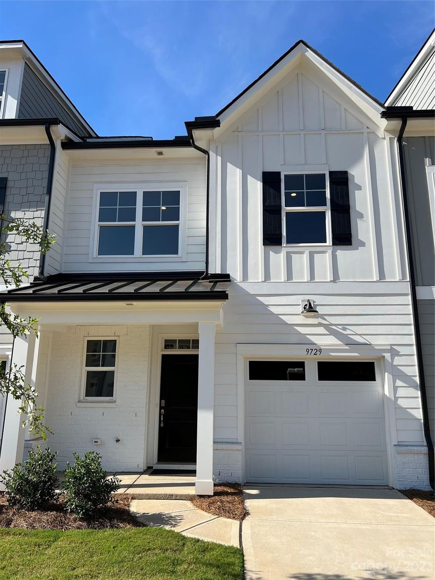 Adore every aspect of this Glenville garage townhome that is part of our luxury Towne Collection. This townhome collection is perfectly situated within the Griffith Lakes master plan community in Charlotte, North Carolina. This new home community features low-maintenance home designs with single-car garages. This particular home features a kitchen that overlooks a spacious great room perfect for hosting guests. The primary bedroom includes a sitting area and the bathroom exudes luxury with granite countertops and double sinks. A home office on the first floor presents a comfortable workspace. Upstairs, a practical laundry room awaits on the second floor with 2 more bedrooms. There are abundant open green areas and interconnected walking paths. The picturesque location and convenient access to premier shopping, dining, and entertainment, make this community a place you’ll want to call home. Don't miss the chance to view this exquisite, ready-to-move-in townhome!