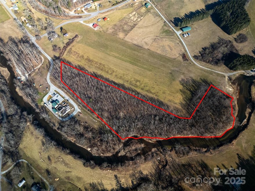 This 8+ acre lot allows for easy access to the French Broad River. It's conveniently located to Main St, the community park, and less than fifteen minutes to downtown Brevard. This is a great opportunity to own land along one of the most beautiful bodies of water in an area known for just that!