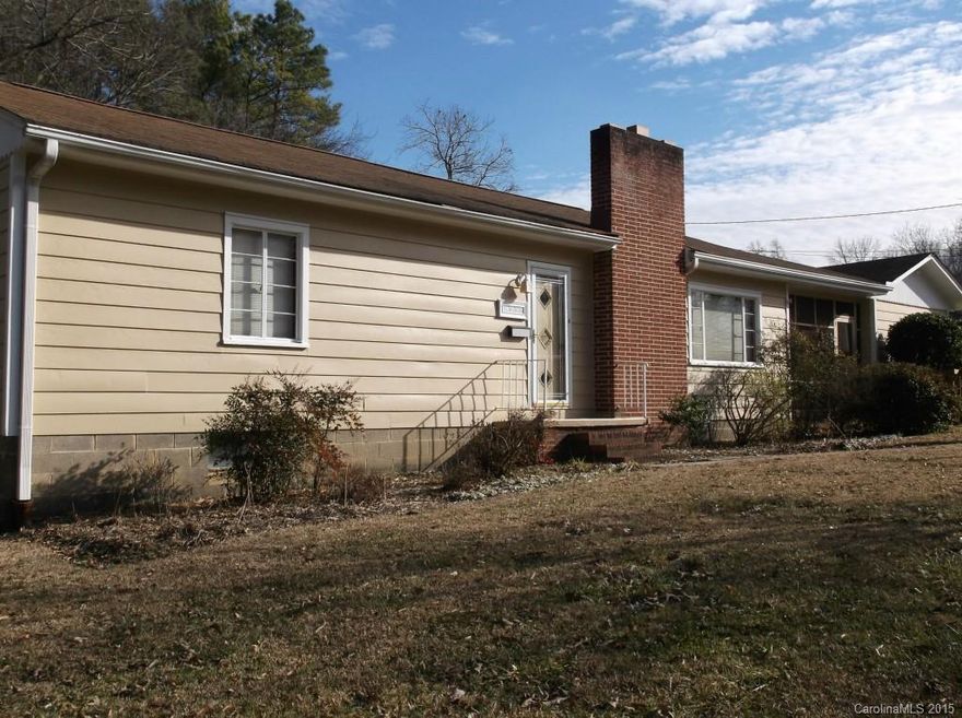 Must see this spacious home.  Hardwood floors throughout, cozy fireplace in living room, large sun filled kitchen, walk-in closet, redwood siding.  Screened porch, garage, fenced yard, walnut trees, and partial finished basement.