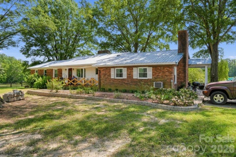Photo of 2661 NC 24/27 Highway W, Mount Gilead, NC 27306 (MLS # 4436352)