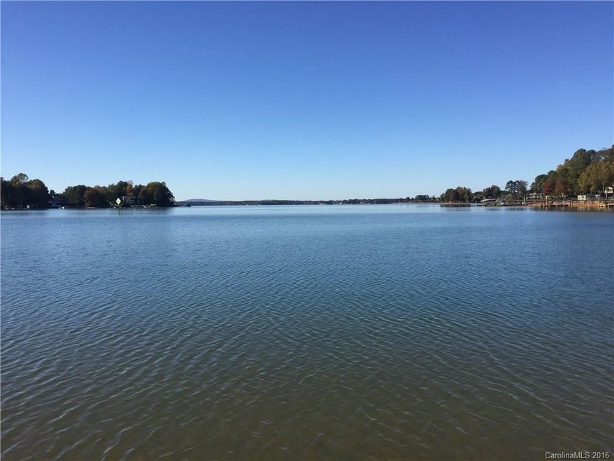 Well maintained WATERFRONT home with an Extremely OPEN floor plan. Great for entertaining inside or out. Relax and take in the Breathtaking lake view with mountains in the distance from the family room, Owner's bedroom, 2nd story deck, sun room or dock. Great Pier with Floating Dock. Partially finished basement. Easy access to I-77, shopping, dining and two county parks with fantastic walking trails.