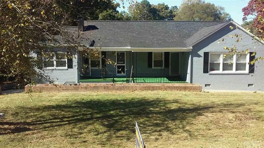 3BR 2BA brick ranch with basement on 2 acre partially cleared lot. Property offers large bedrooms, large open living area a functional kitchen. Side deck off one bedroom for great outdoor living space. Interior & exterior entrance to unfinished basement space great for storage or workshop. Paved driveway to back of house with large double carport at back, plus access to back part of land which has outbuildings and is wooded and partially fenced.  Brand new roof and recently painted inside and out.