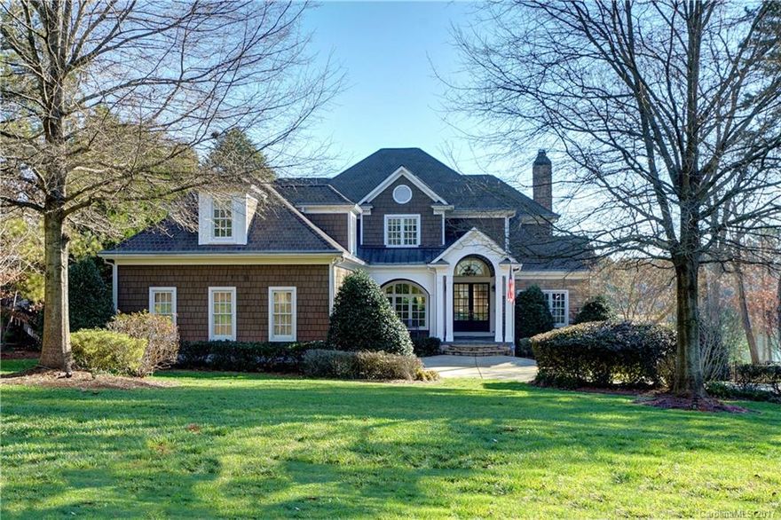 PRICED to SELL! WF home w/stunning views from almost every room. Chef's gourmet kitchen w/ Viking 6 burner, double island & double oven. Luxury spacious MBR w/ his & her closets, spa tub & shower room. Two-story GR, study w/ coffered ceiling, custom barrel wood ceiling foyer. LL features 2nd kitchen & 2nd Master-possible use as MIL suite. Three beautiful FPs. Entire home audio system. Oversized covered dock w/ deep water, seawall, fire pit, hot tub & level yard.Possible vacation rental income!