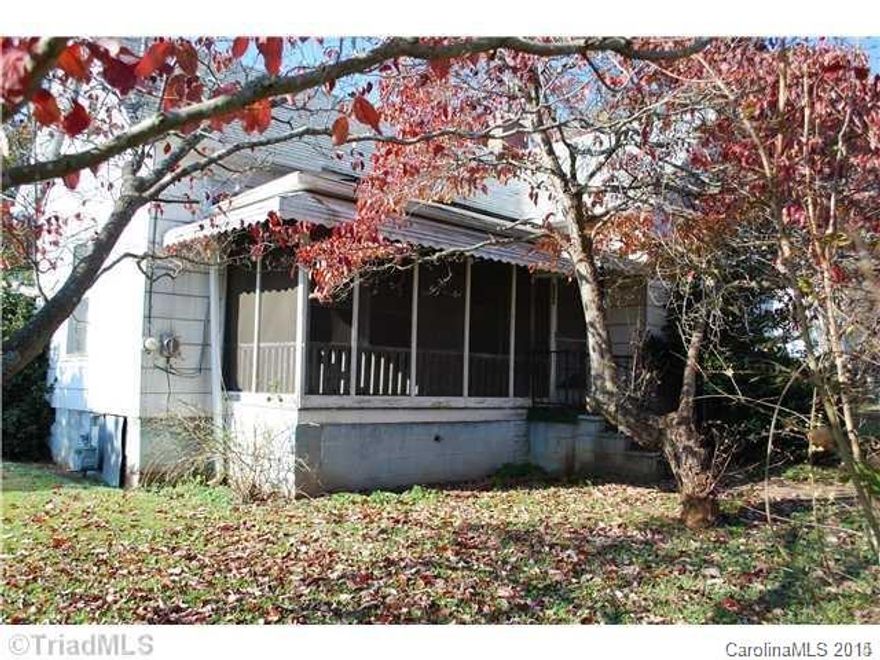 Historic Cooleemee Mill Home with 2BR, 1BA, Natural Gas furnace and central air, large room sizes, screened front porch, covered back porch, close to shopping, school and churches.  Needs a little TLC.  Owner selling As Is.